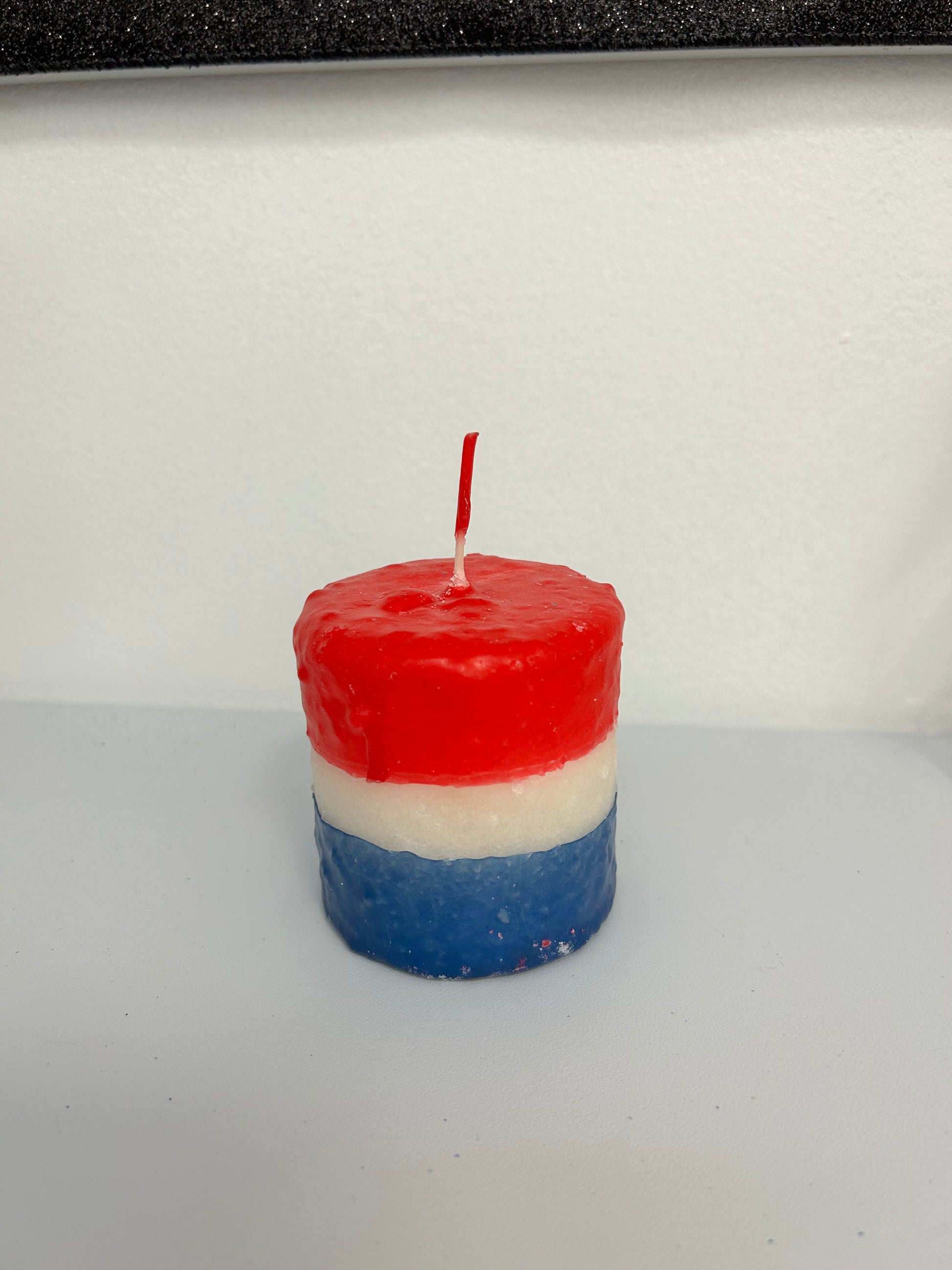 red white and blue hearth candle