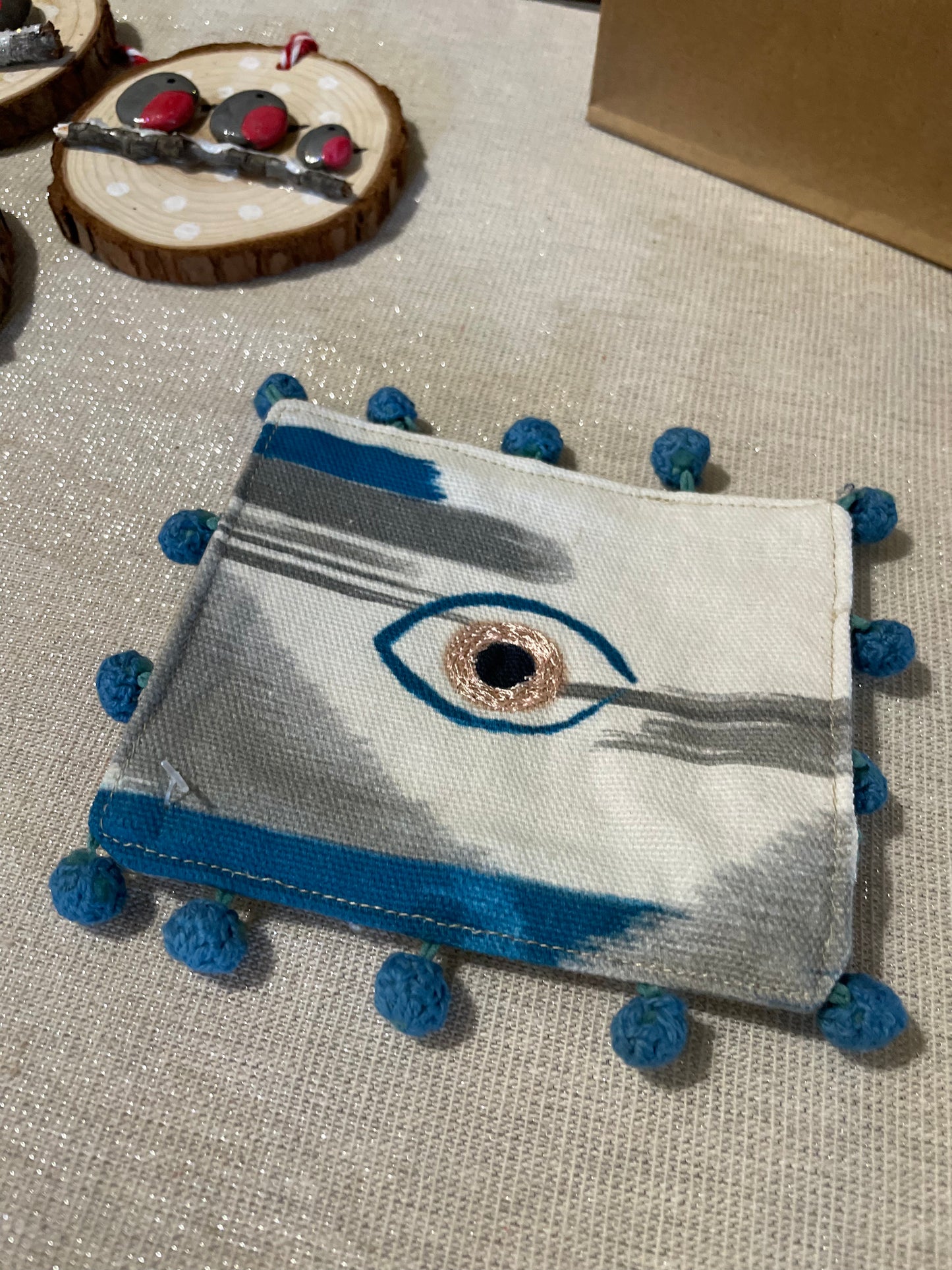 fabric coaster with evil eye
